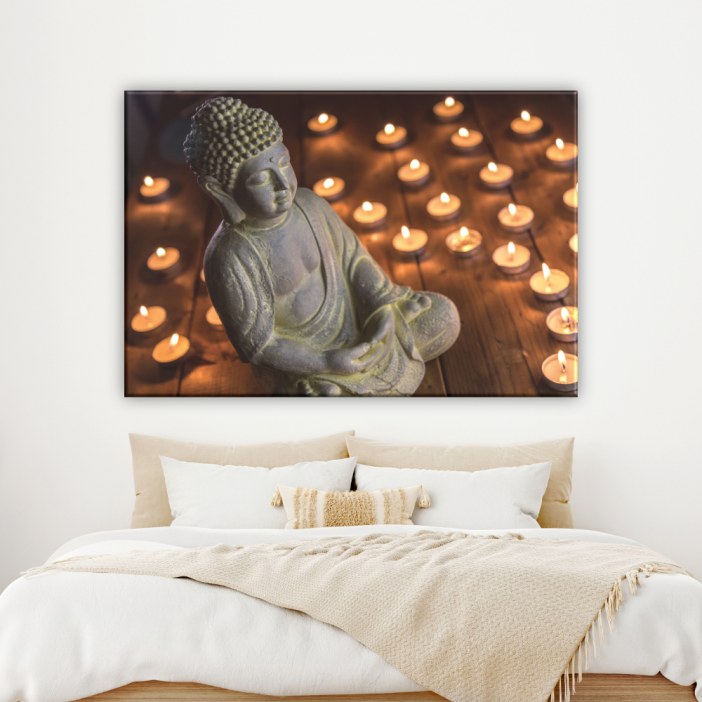 Quadro Buda sentado em frente de uma vela