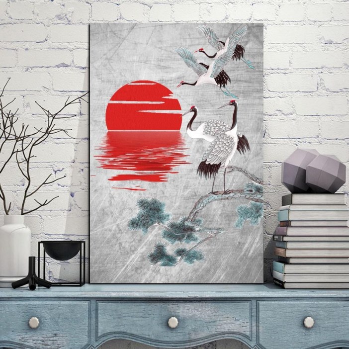 Tableau grue et soleil rouge